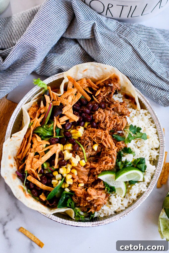 Experience the delight of juicy sweet pork, zesty cilantro-lime rice, and creamy tomatillo-ranch dressing in this homemade copycat Café Rio salad—even better when made fresh at home.