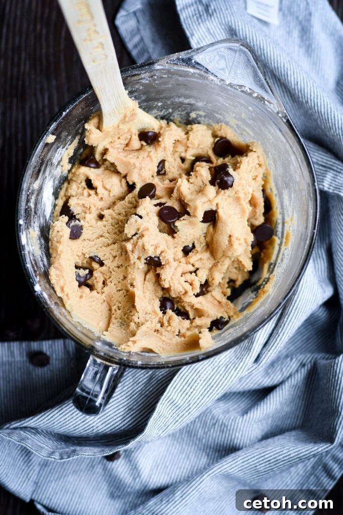 These thick and chewy brown sugar chocolate chip cookies are soft, gooey, and packed with rich caramel flavor. Perfect for dessert lovers! 
