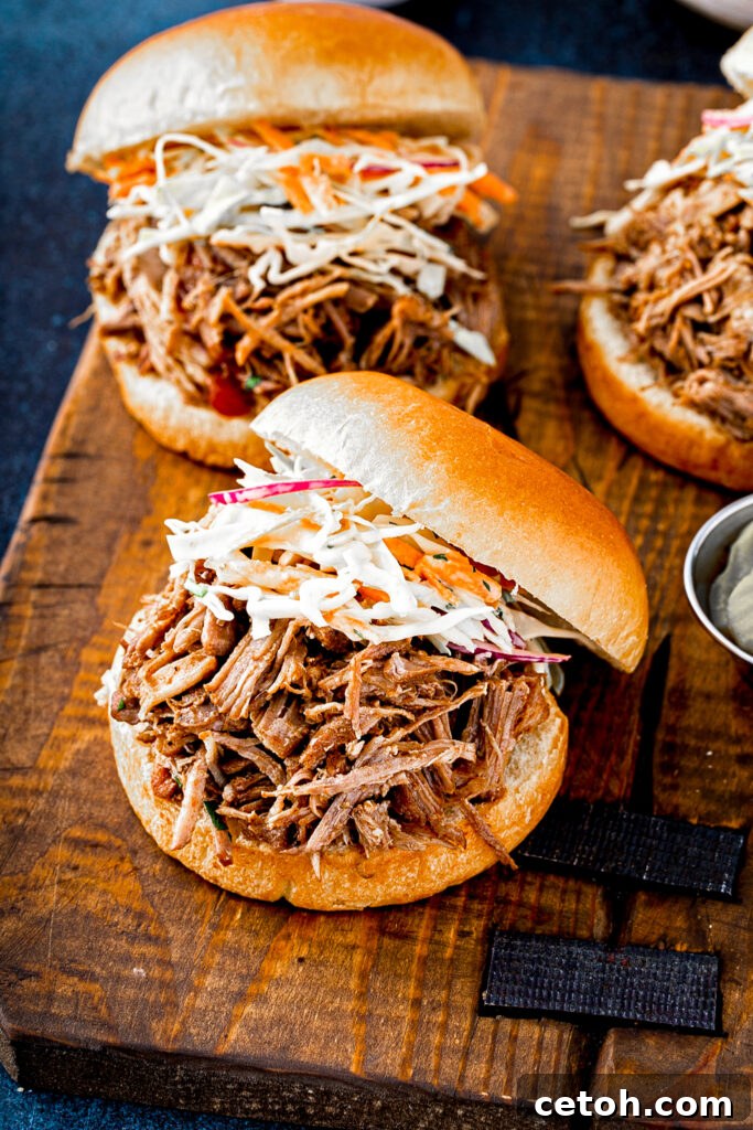 A dish of Dutch Oven Boston Butt BBQ ready to be enjoyed with family and friends.