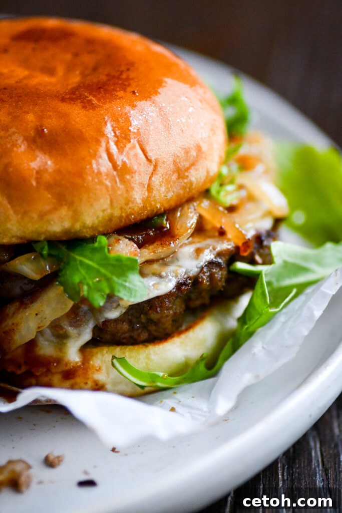 Elevate your burger game with this Swiss Onion Burger recipe! Juicy beef, melted Swiss cheese, and caramelized onions—your new favorite!