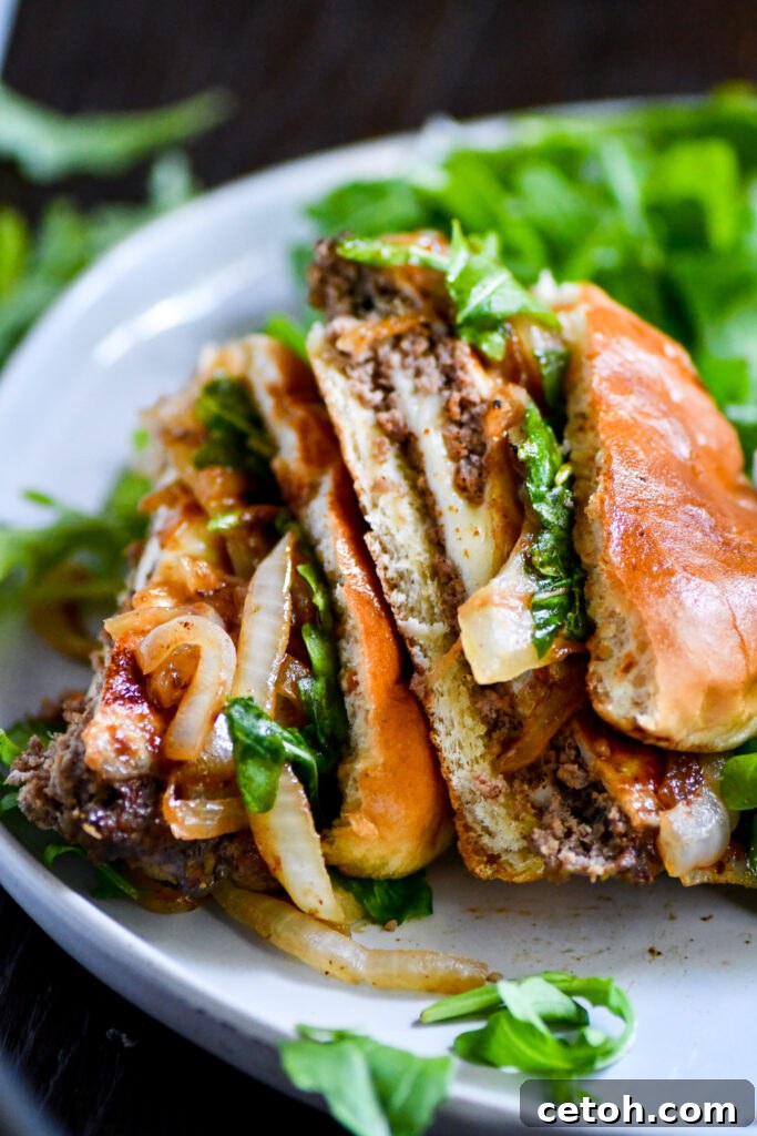Hosting a BBQ? Impress your guests with these Swiss Onion Burgers—juicy, cheesy, and absolutely delicious!