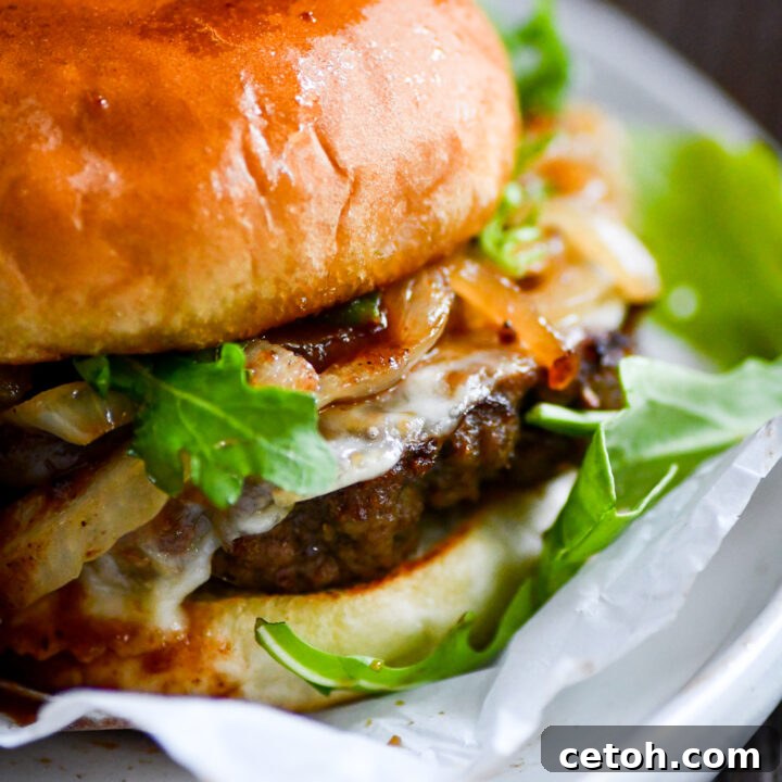 Elevate your burger game with this Swiss Onion Burger recipe! Juicy beef, melted Swiss cheese, and caramelized onions—your new favorite!