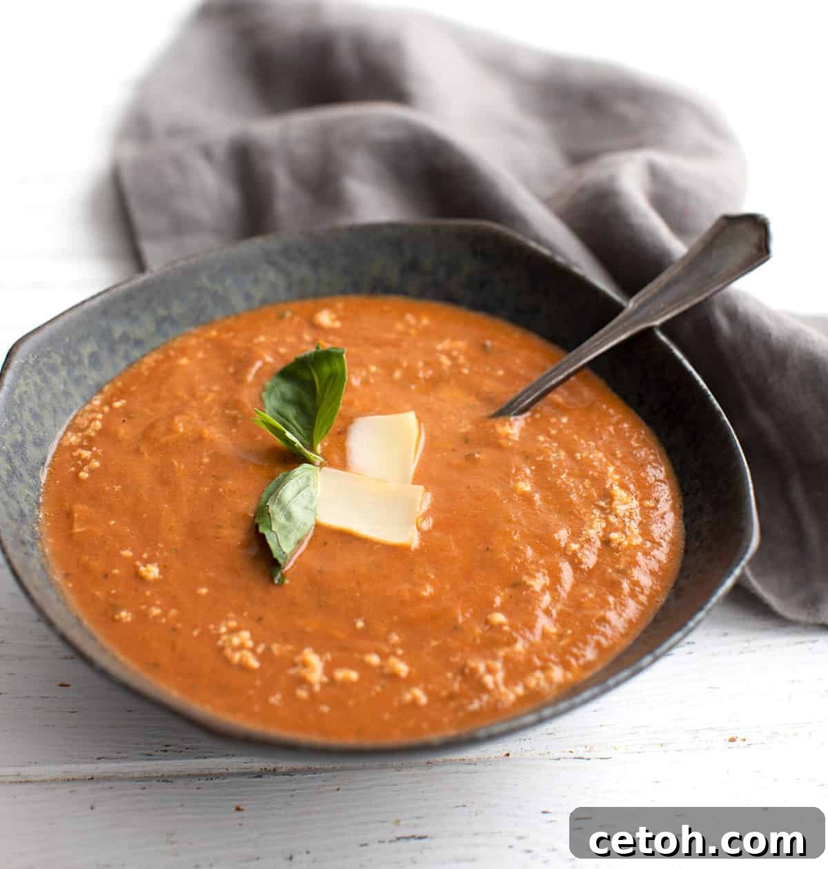 Close-up of creamy Roasted Tomato Soup in a bowl.