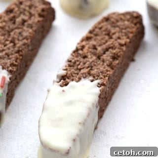 Close up shot of keto gingerbread biscotti dipped in sugar-free white chocolate