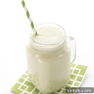 Velvety Keto Avocado Shake 2 Creamy avocado smoothie in a large glass mug