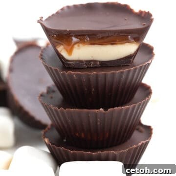 Keto Cloud Cups 2 Close up shot of Keto Mallow Cups cut open to show the caramel dripping out.