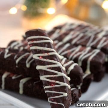 Close up shot of keto chocolate peppermint biscotti on a white plate.