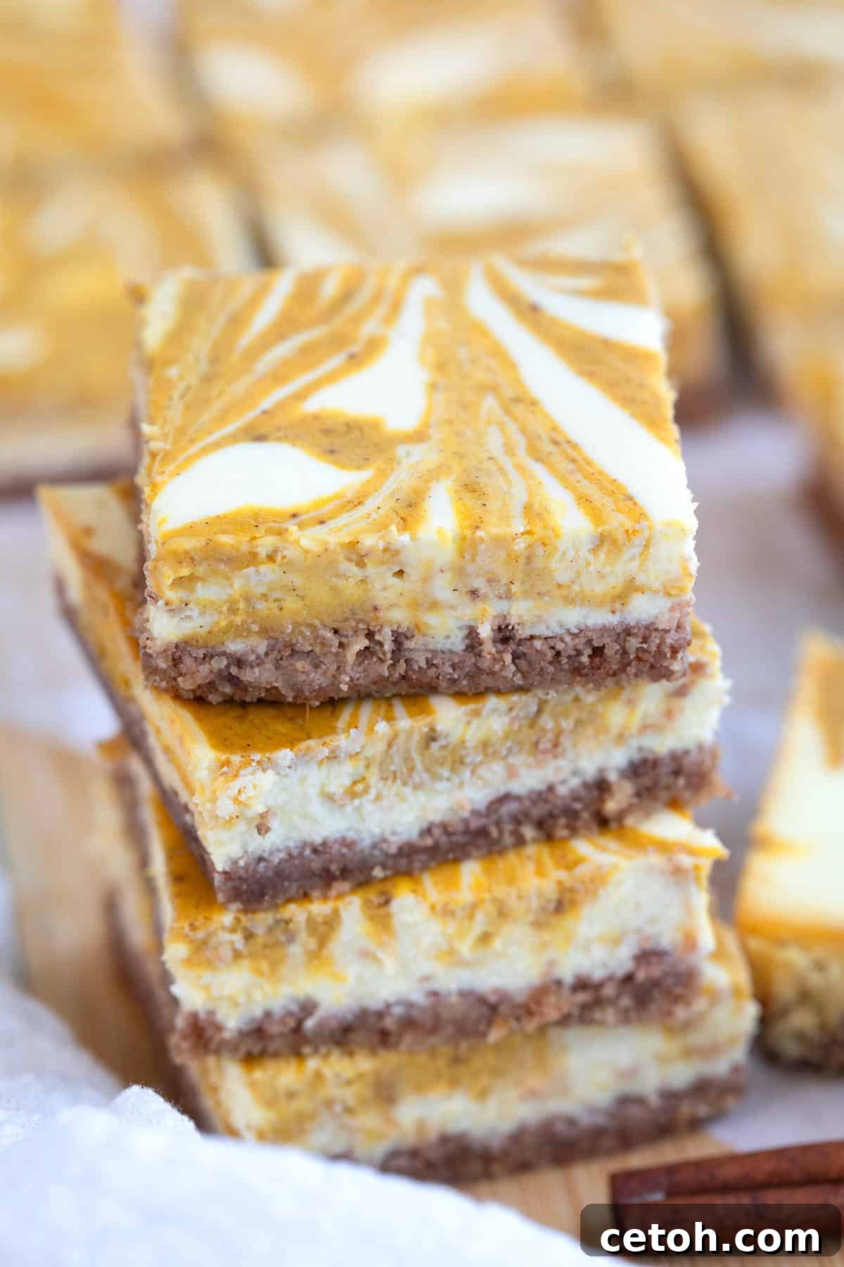 Keto Pumpkin Swirl Cheesecake Bars 3 pumpkin swirl cheesecake bars
